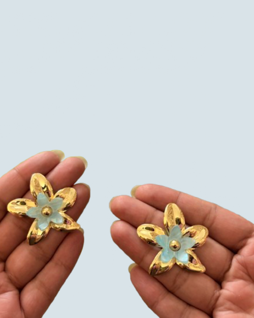 Minimalist ivory layered bloom gold studs held in hand to show scale - Trinketly BD
