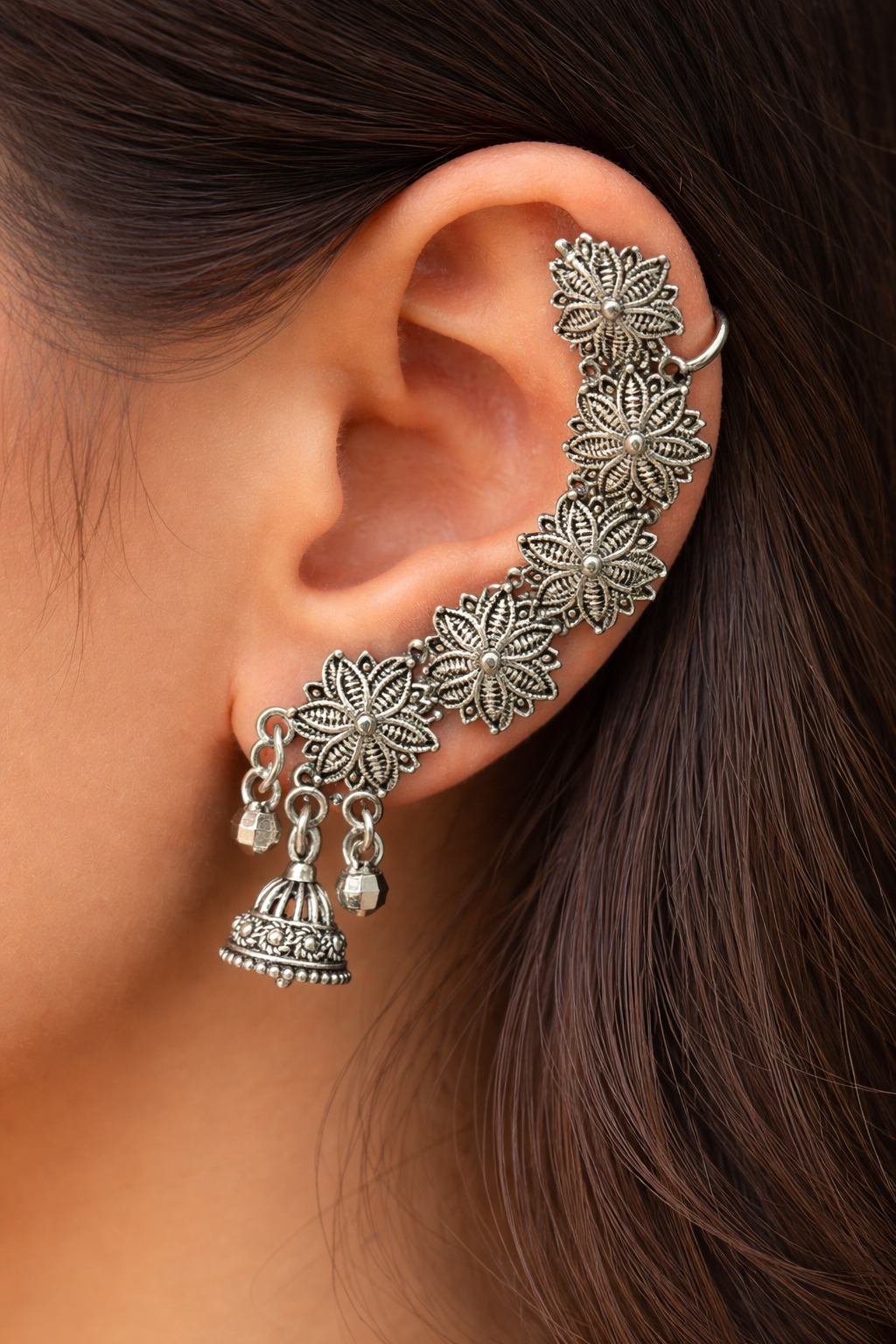 Model wearing ornate floral oxidized silver cuff earrings for a trendy casual look - Trinketly BD
